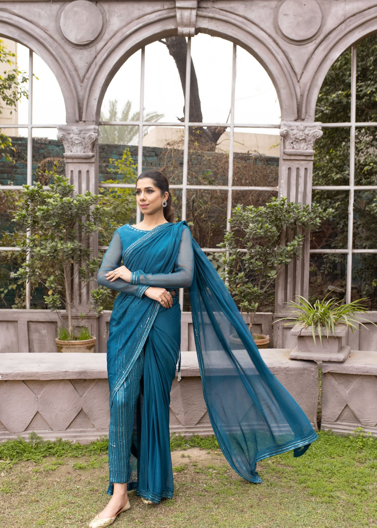 Sadia Tariq's Noor E Hira. Sea green chiffon saree, embellished pants. Ceremonial essence revived.