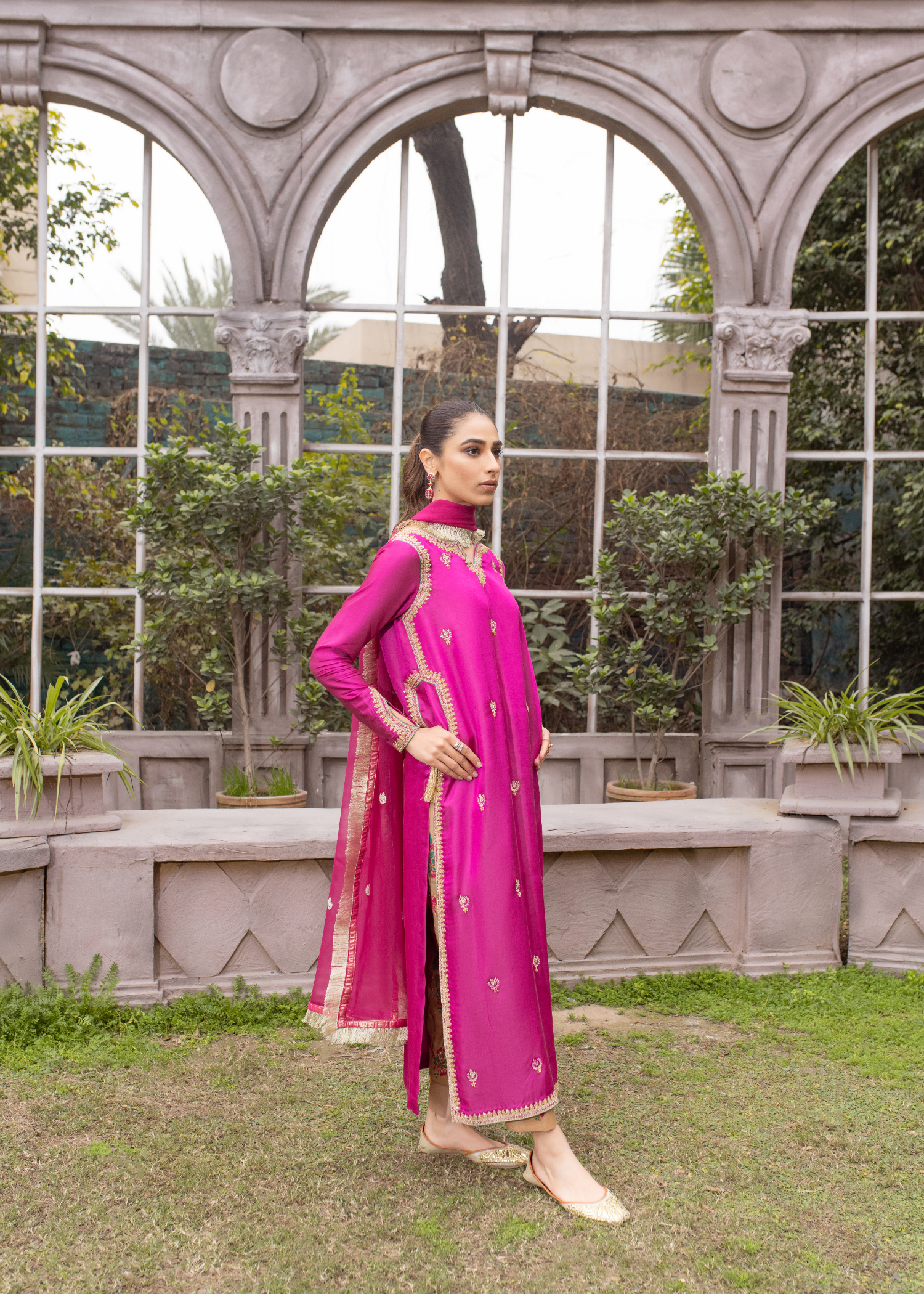 Luxurious Sadia Tariq ensemble: Dark pink silk shirt with intricate bead work, paired with raw silk shalwar & chiffon dopata.