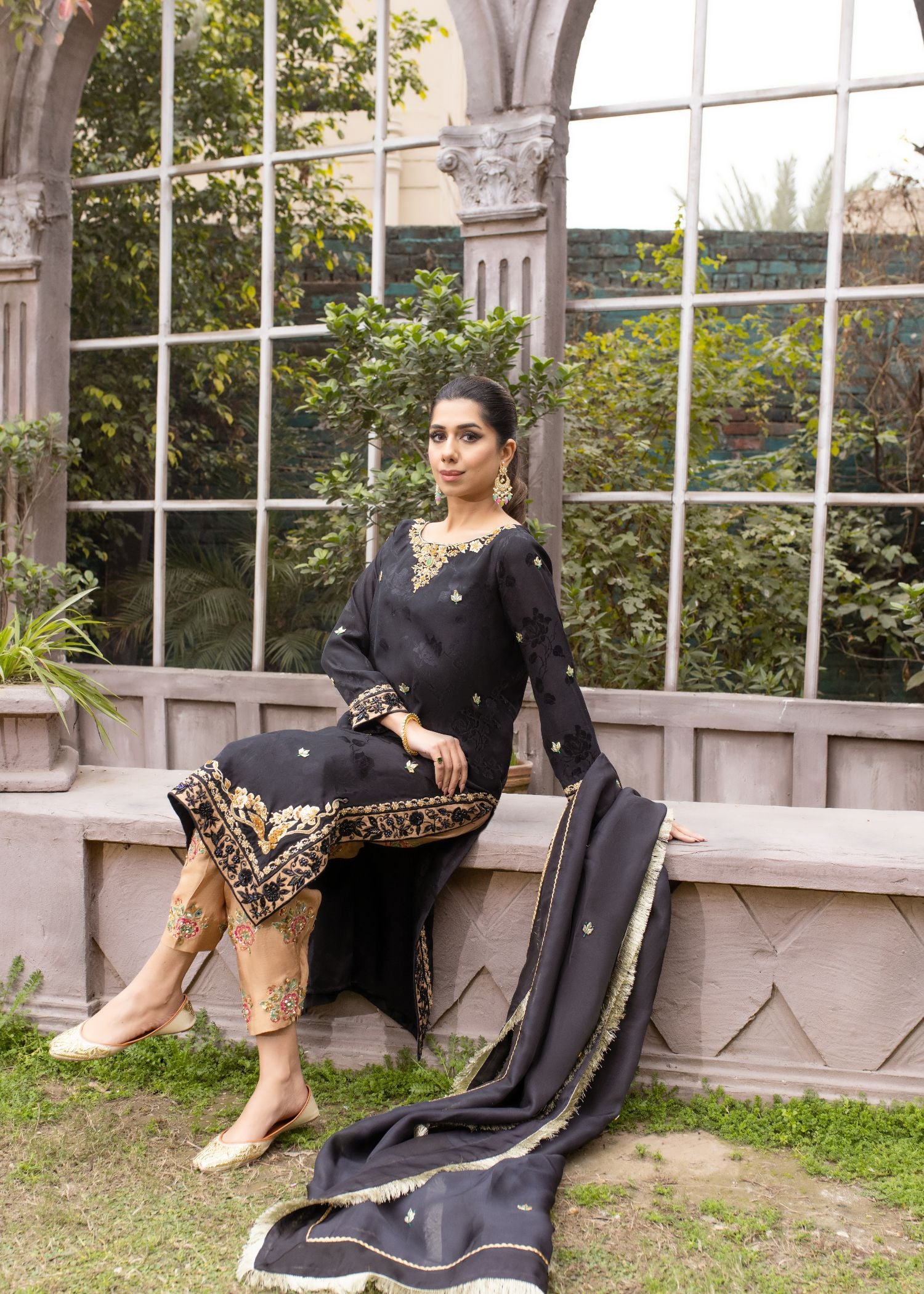 Elegant Sadia Tariq black ensemble: silk shirt, shalwar & organza dupatta. Gold accents, intricate embroidery.
