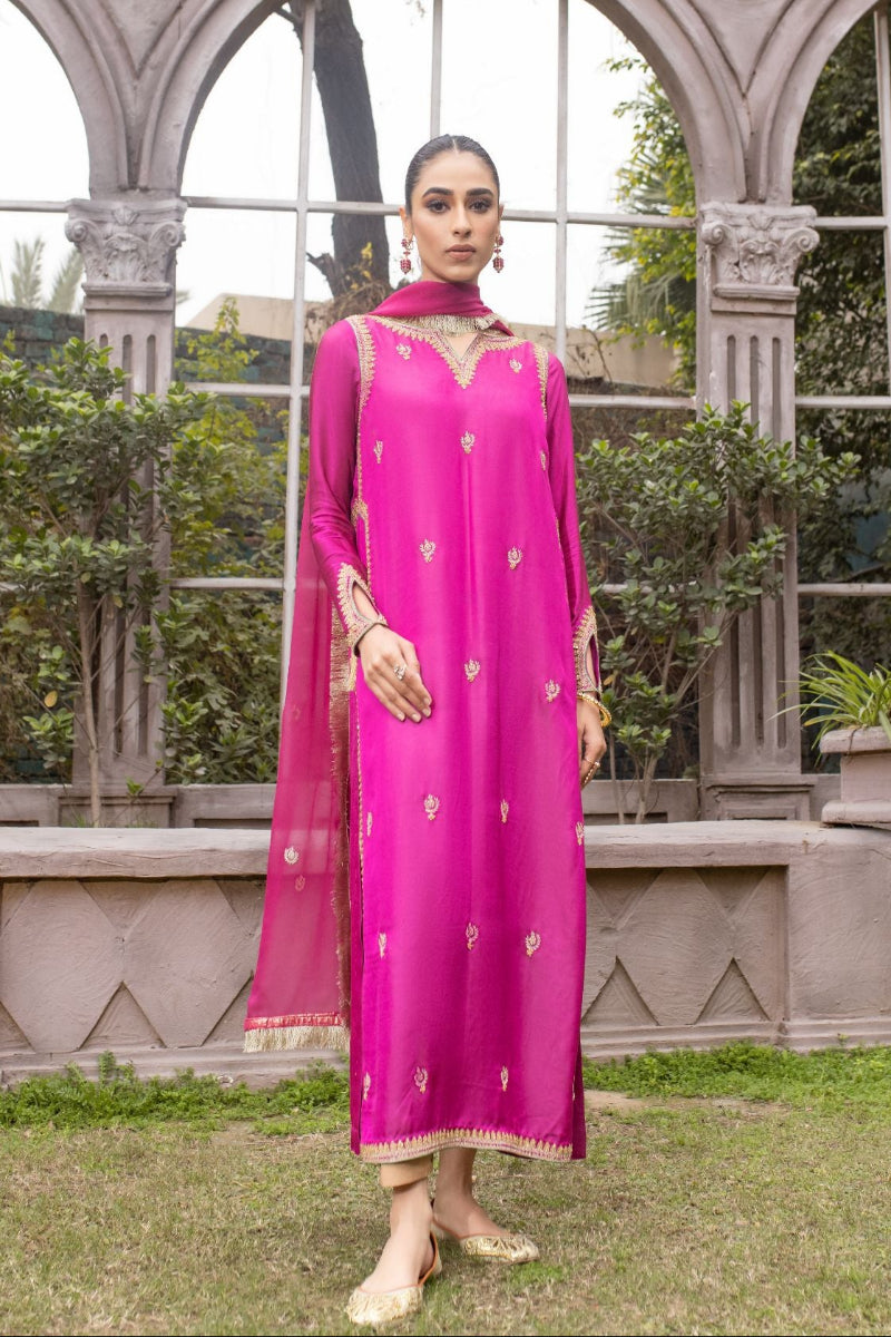 Luxurious Sadia Tariq ensemble: Dark pink silk shirt with intricate bead work, paired with raw silk shalwar & chiffon dopata.