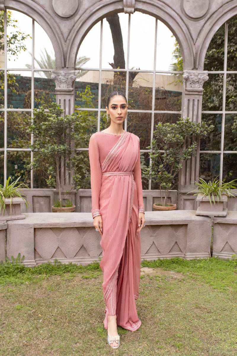 Sadia Tariq's Noor E Hira in Pink. Chiffon saree, embellished pants. Ceremonial essence revived.